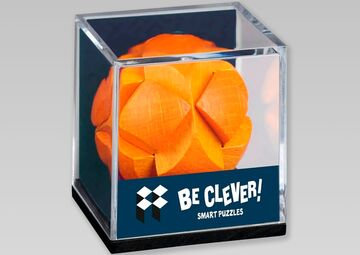 Ansicht auf einen orangefarbenen Ball in einer durchsichtigen Umrandung.