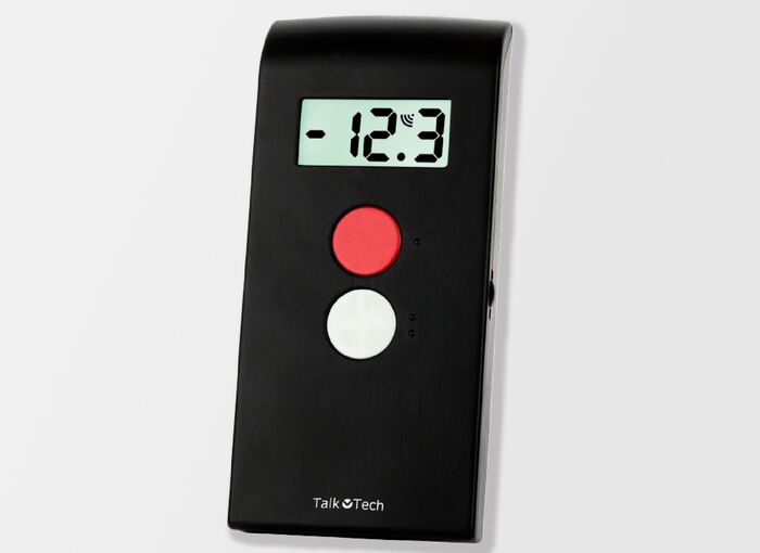 Ansicht auf das schwarze Gerät mit kleinem Display und einem roten und weißen Punkt.