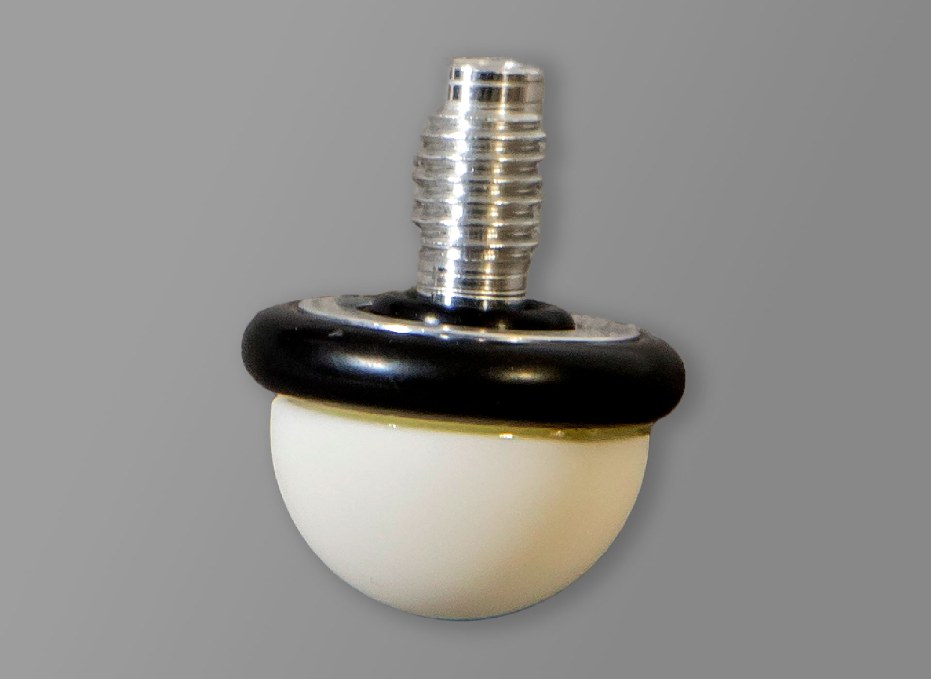 Ansicht auf eine weiße Rollspitze mit Gummiring für einen Blindenlangstock