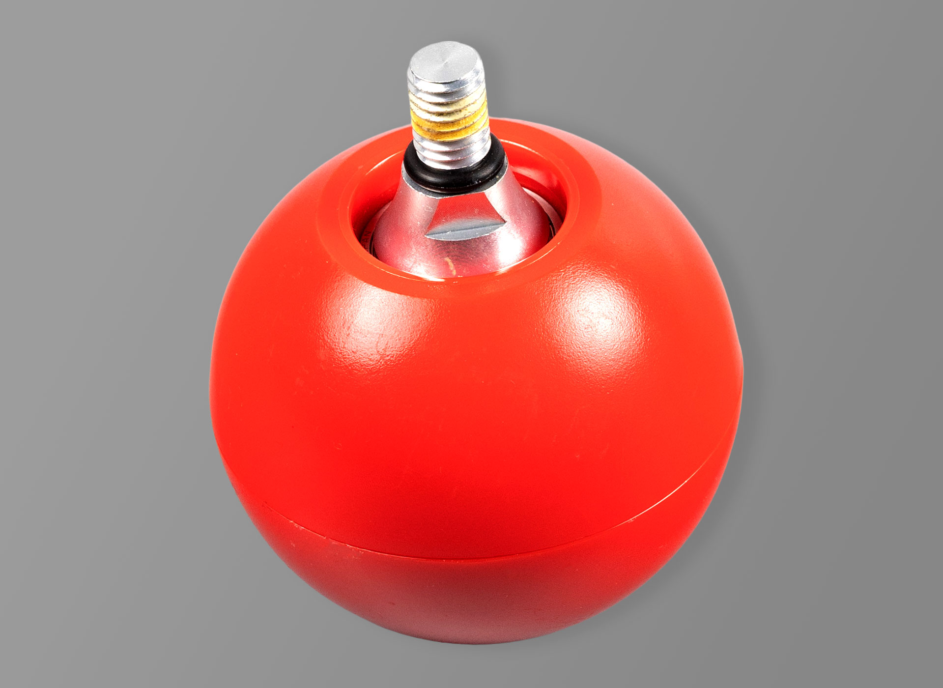 Ansicht auf eine rote ballförmige Rollspitze für einen Blindenlangstock