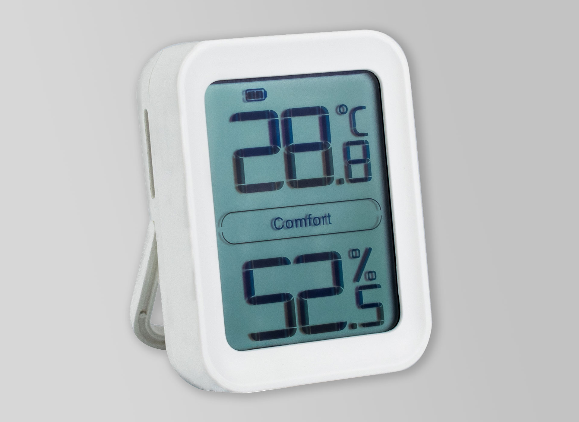 Ansicht auf ein weiß umrandetes Thermometer als viereckigen Kasten.